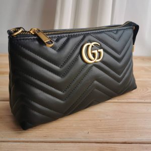 Сумка-косметичка Gucci GG