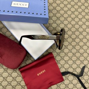 Солнцезащитные очки Gucci