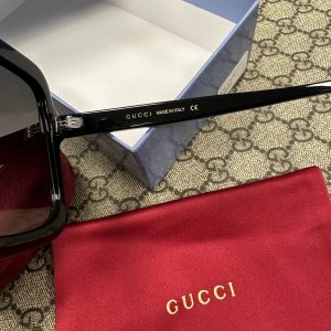 Солнцезащитные очки Gucci